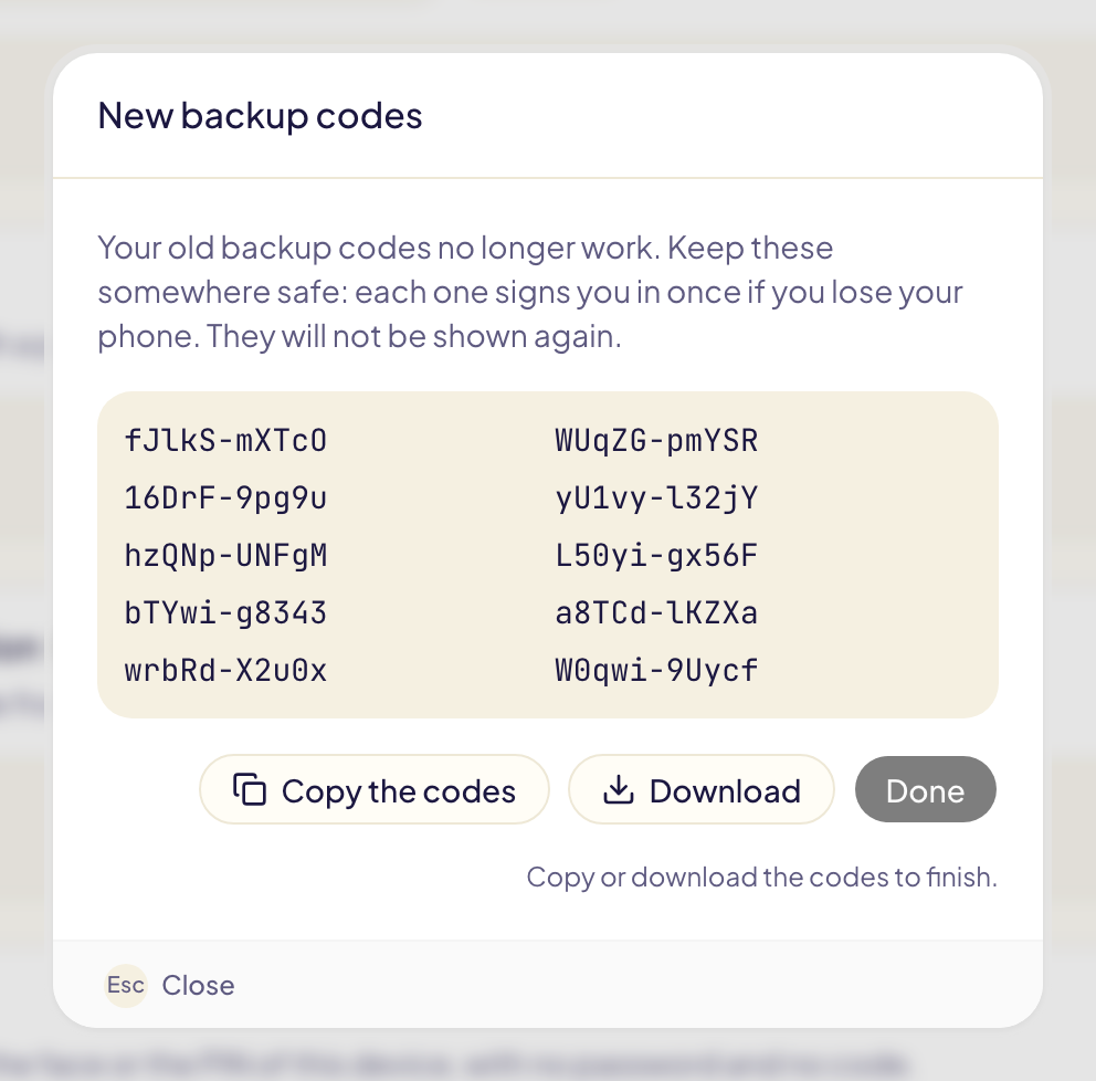The New backup codes dialog: 10 codes, then Copy the codes, Download, and Done, which stays off until the codes are saved